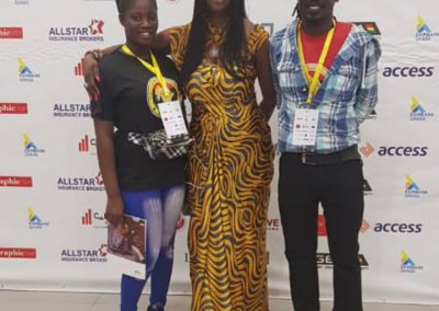 Three people posing at Ghana Summit 2019.